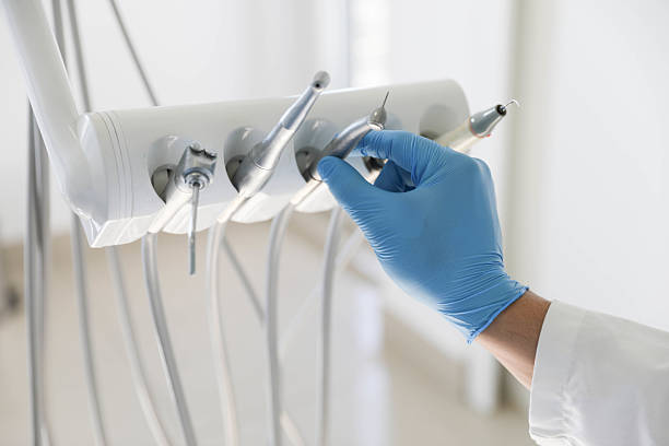 Professional Tooth Extraction technician working in Kalamazoo, MI